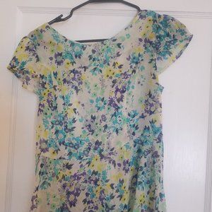 Semi-Sheer Peplum Blouse